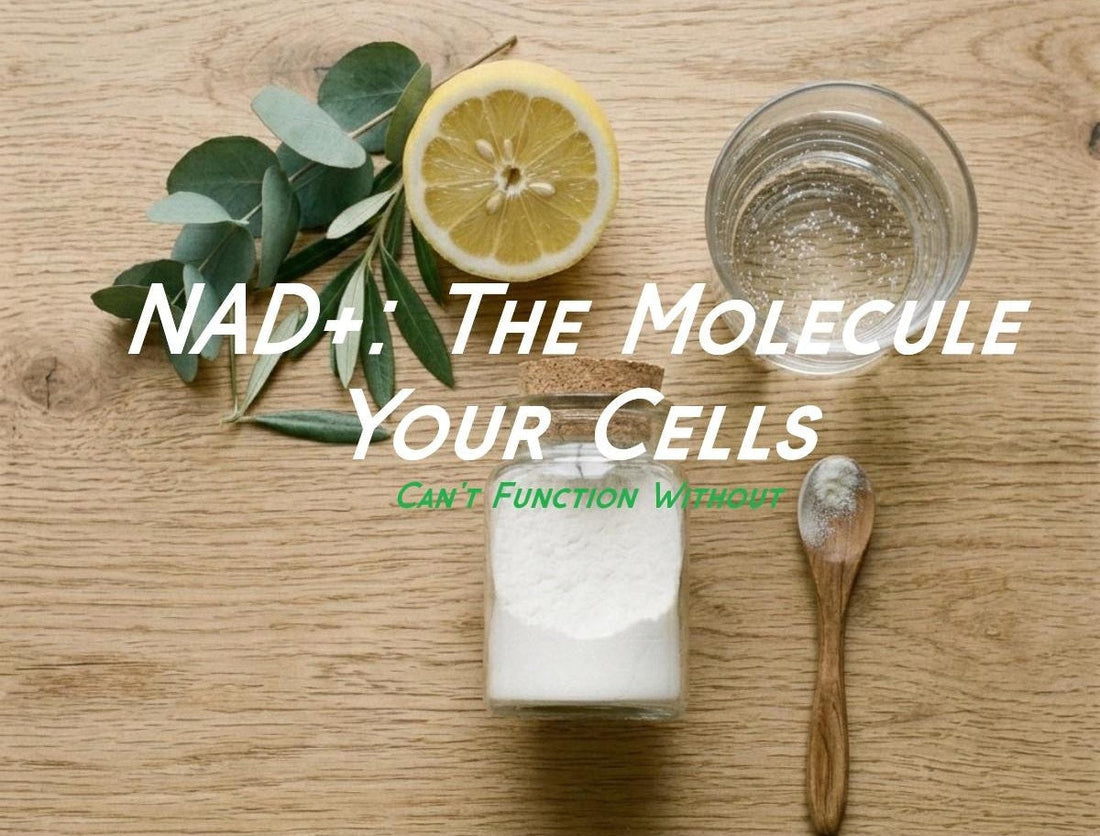 Top-down view of NMN powder on a wooden table with a lemon, a glass of water, and green leaves, featuring the text overlay: "NAD+: THE MOLECULE YOUR CELLS CAN'T FUNCTION WITHOUT".