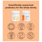 Two BioGaia probiotic supplement bottles displayed on a peach-colored background with promotional text and six circular badges highlighting product features such as scientifically researched, lactose free, milk free, gluten free, no FOS fibres, and no artificial colourings.