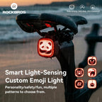 Smart light-sensing custom emoji light on a scooter with RockBros branding.