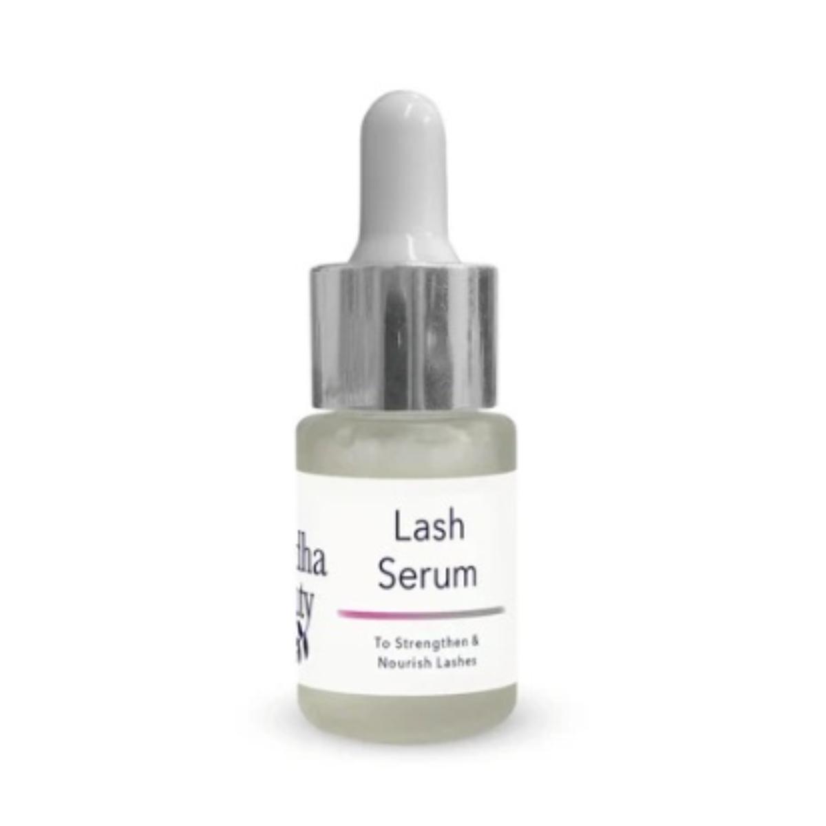 Buddha Beauty Lash Elixir Serum bottle and applicator