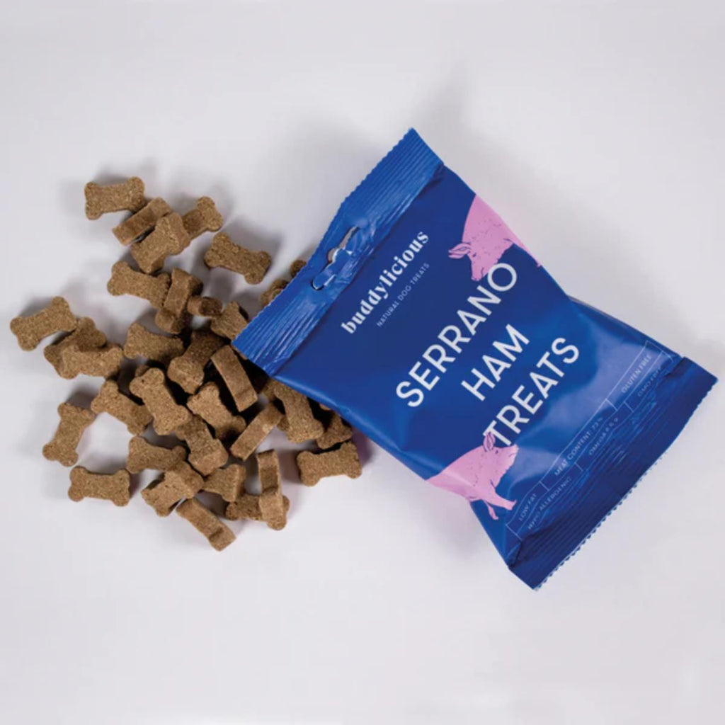 Buddylicious Training Treats Bundle with seven varieties of natural dog training treats including Serrano meats, wild deer, wild boar and cod skin cubes