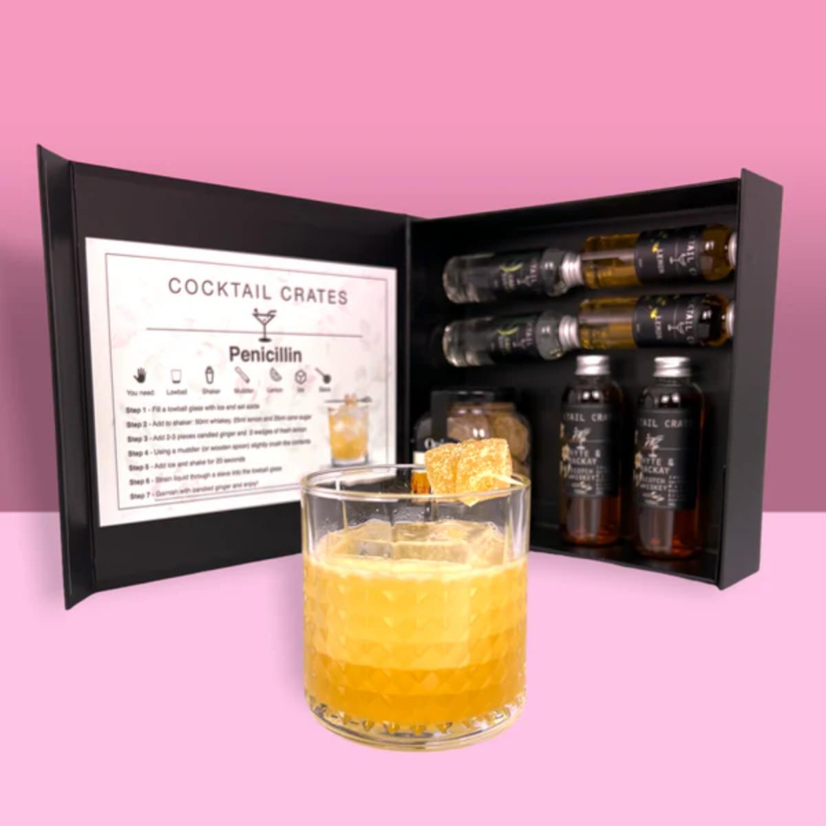 Penicillin Cocktail Gift Box contents: whisky, lemon, sugar, candied ginger

Cocktail being poured from Penicillin kit