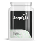 Forever Feeling SLEEP TIGHT Sleeping Pills bottle on bedside table in warm lighting