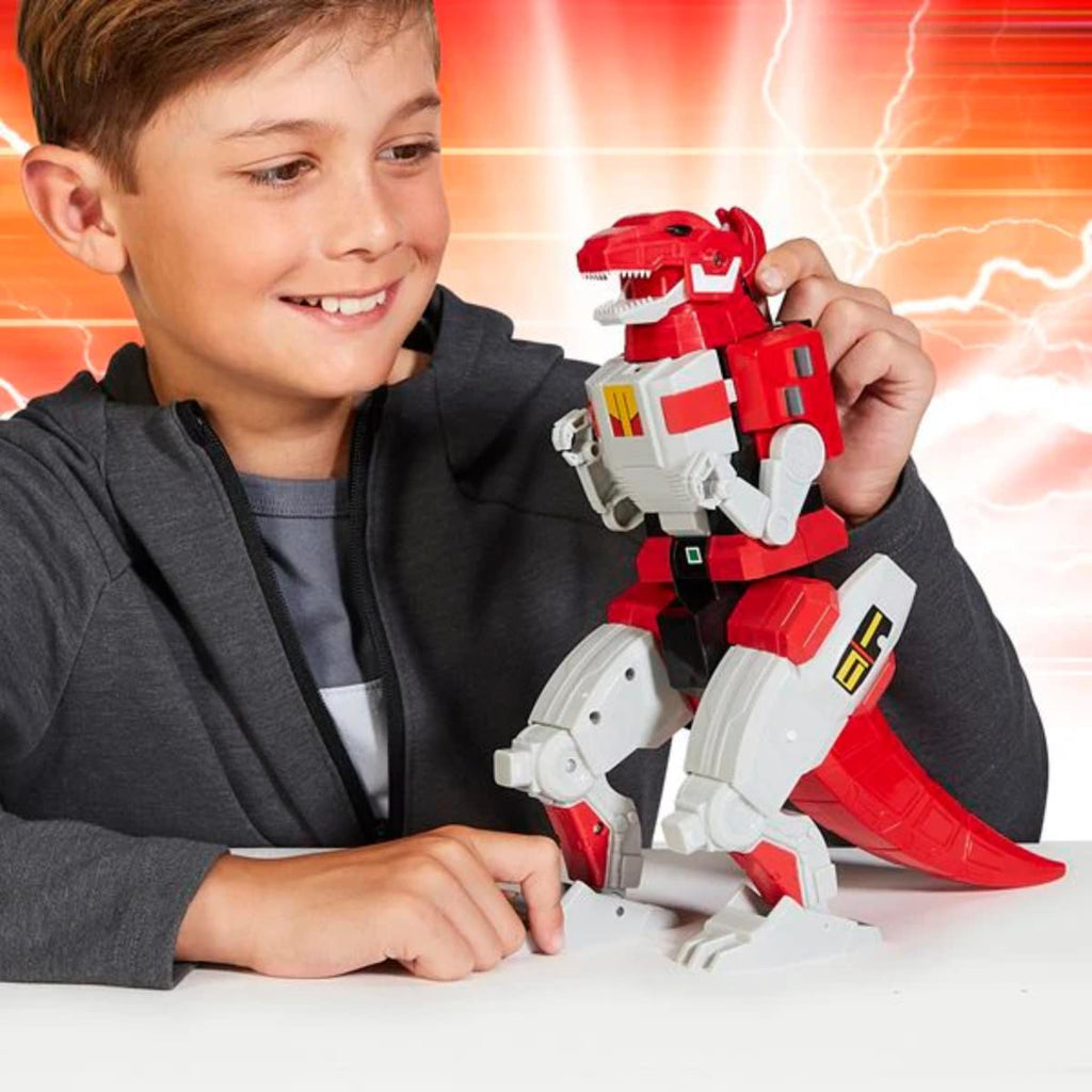 Child playing with a red and white robot toy against a dynamic background