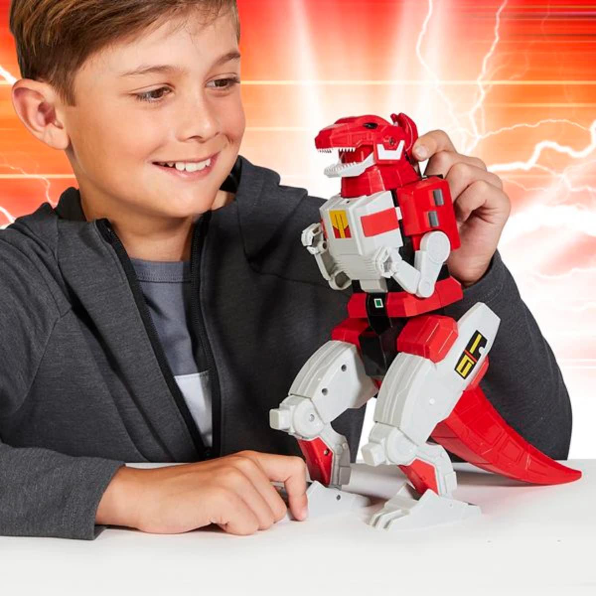 Child playing with a red and white robot toy against a dynamic background