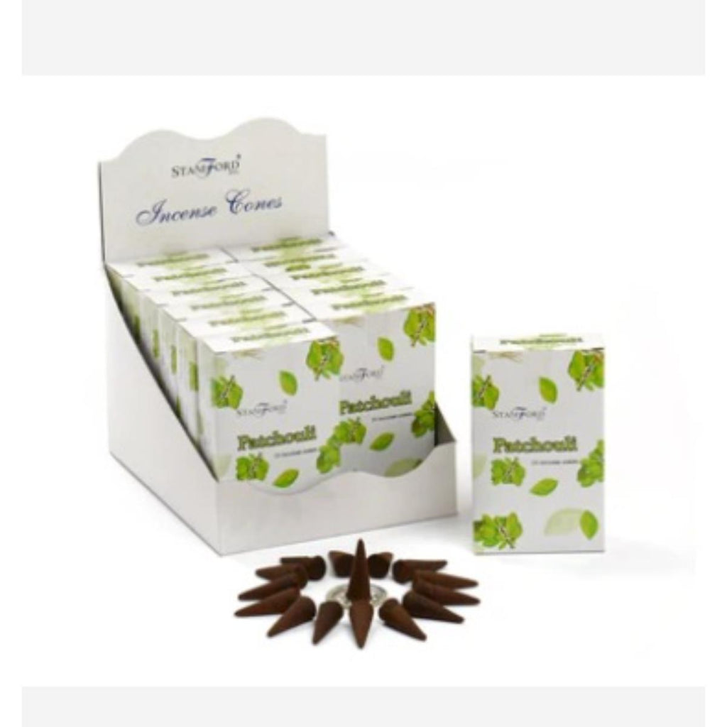 Patchouli incense cones arranged on a surface, releasing warm earthy fragrance.