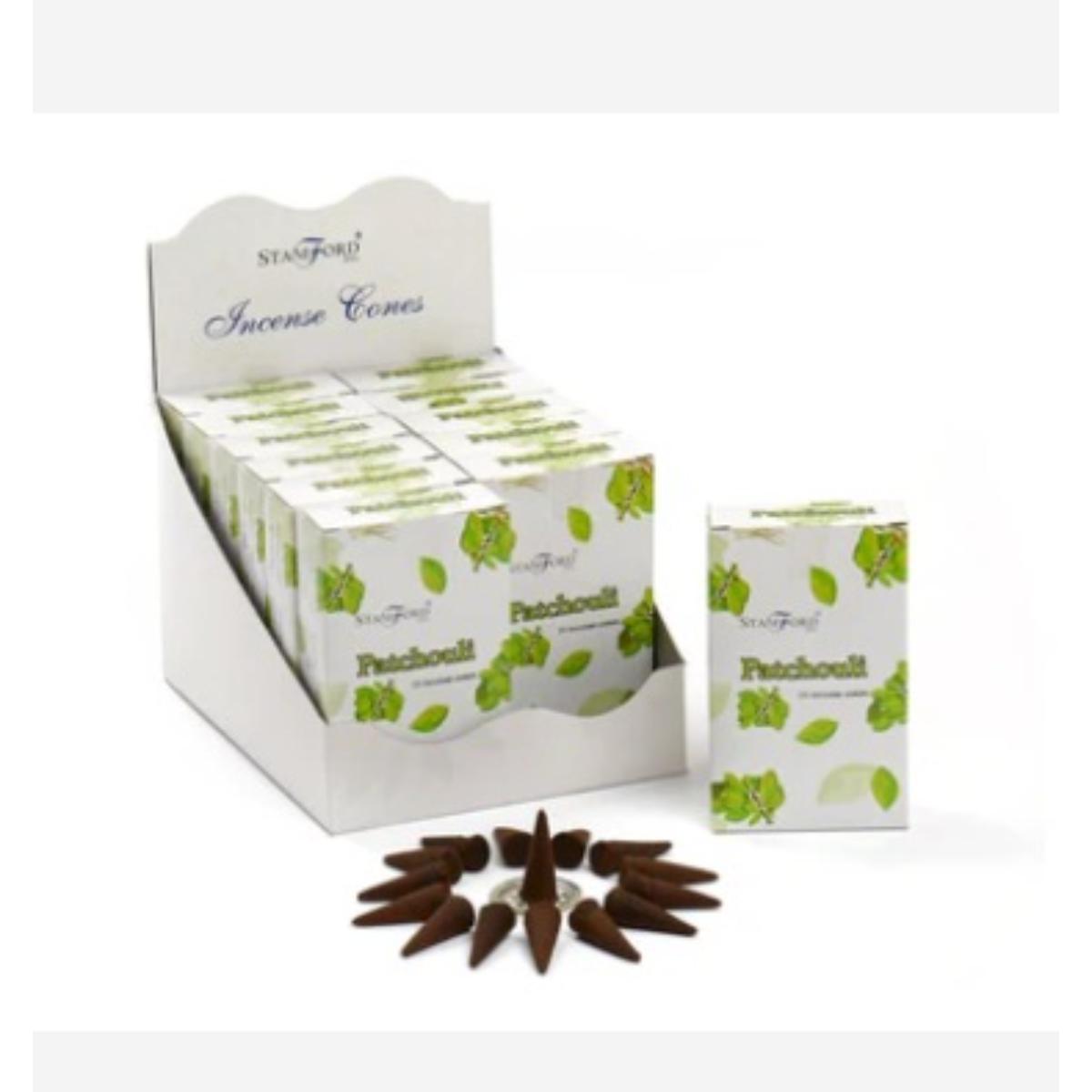 Patchouli incense cones arranged on a surface, releasing warm earthy fragrance.