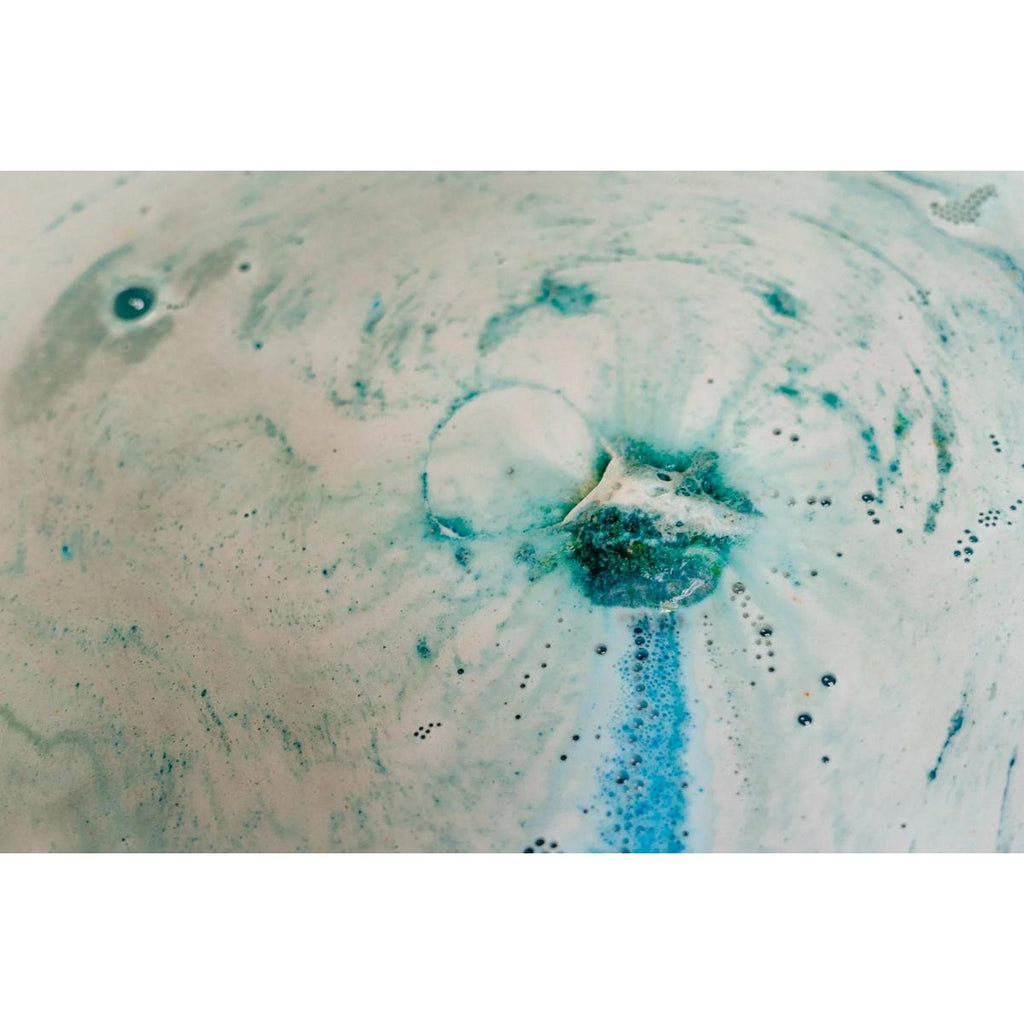 Deep blue masculine bath bomb with cologne-inspired scent profile