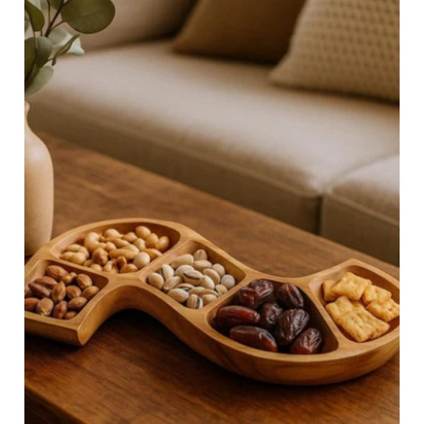 Hand‑carved snake‑shaped teak bowl with natural wood grain, decorative wooden home decor piece