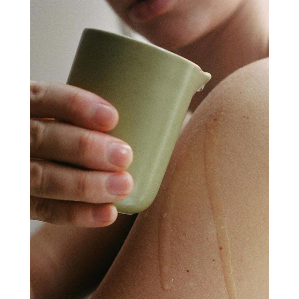 Night Touch massage candle by SITRE in ceramic vessel