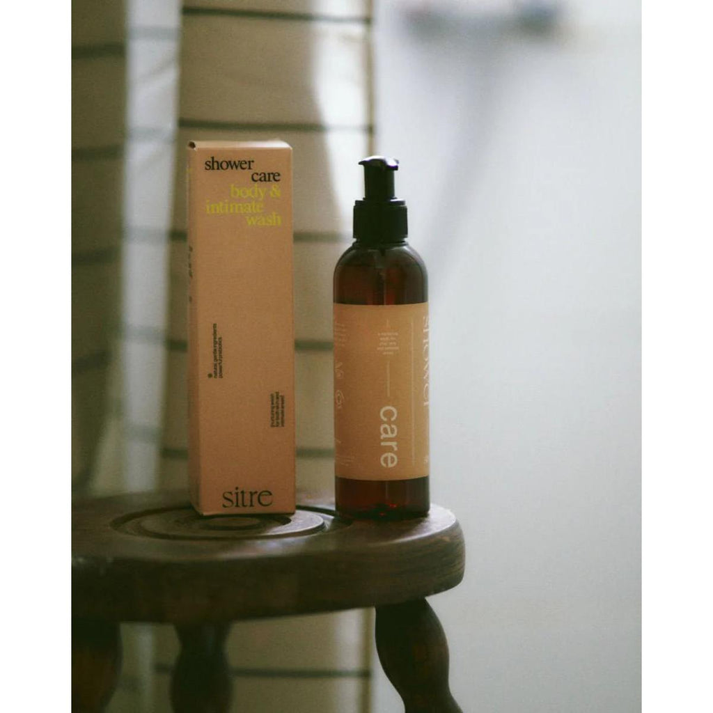 SITRE Shower Care bottle on bathroom shelf