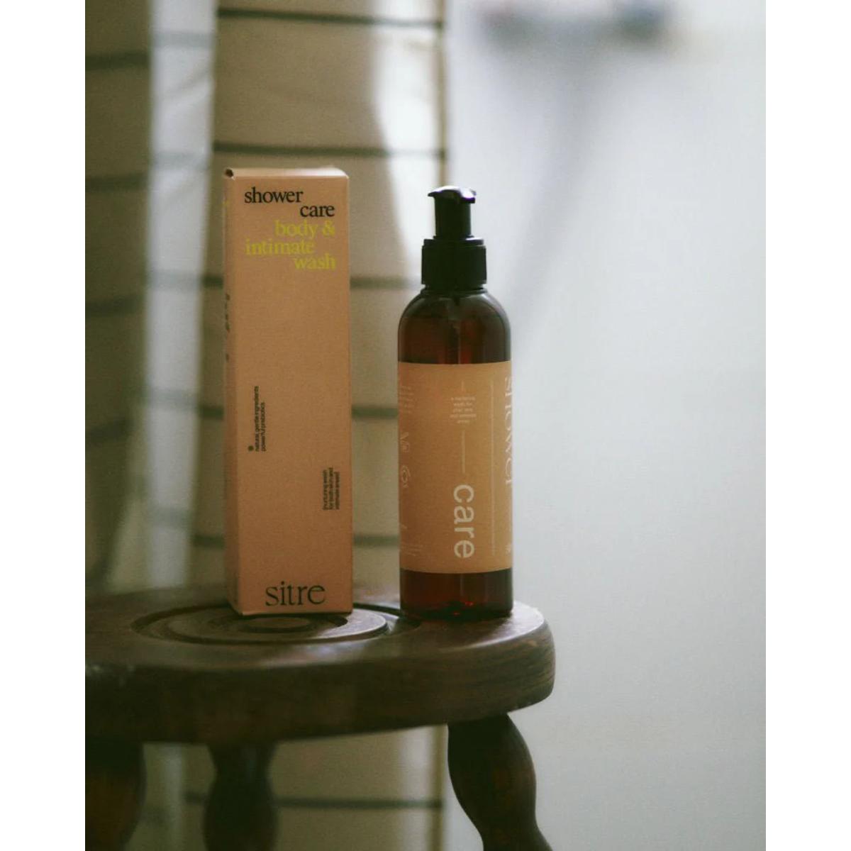 SITRE Shower Care bottle on bathroom shelf